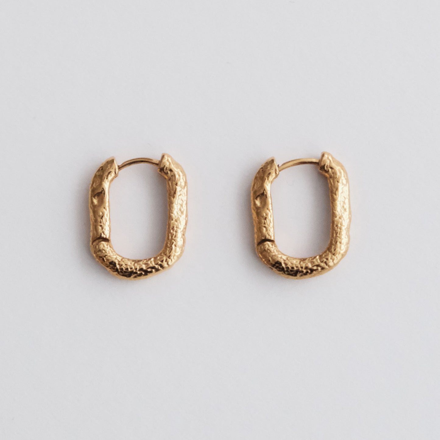 Molten Huggie Earrings Gold