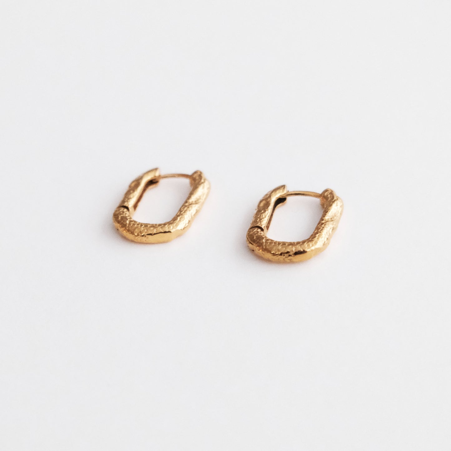 Molten Huggie Earrings Gold